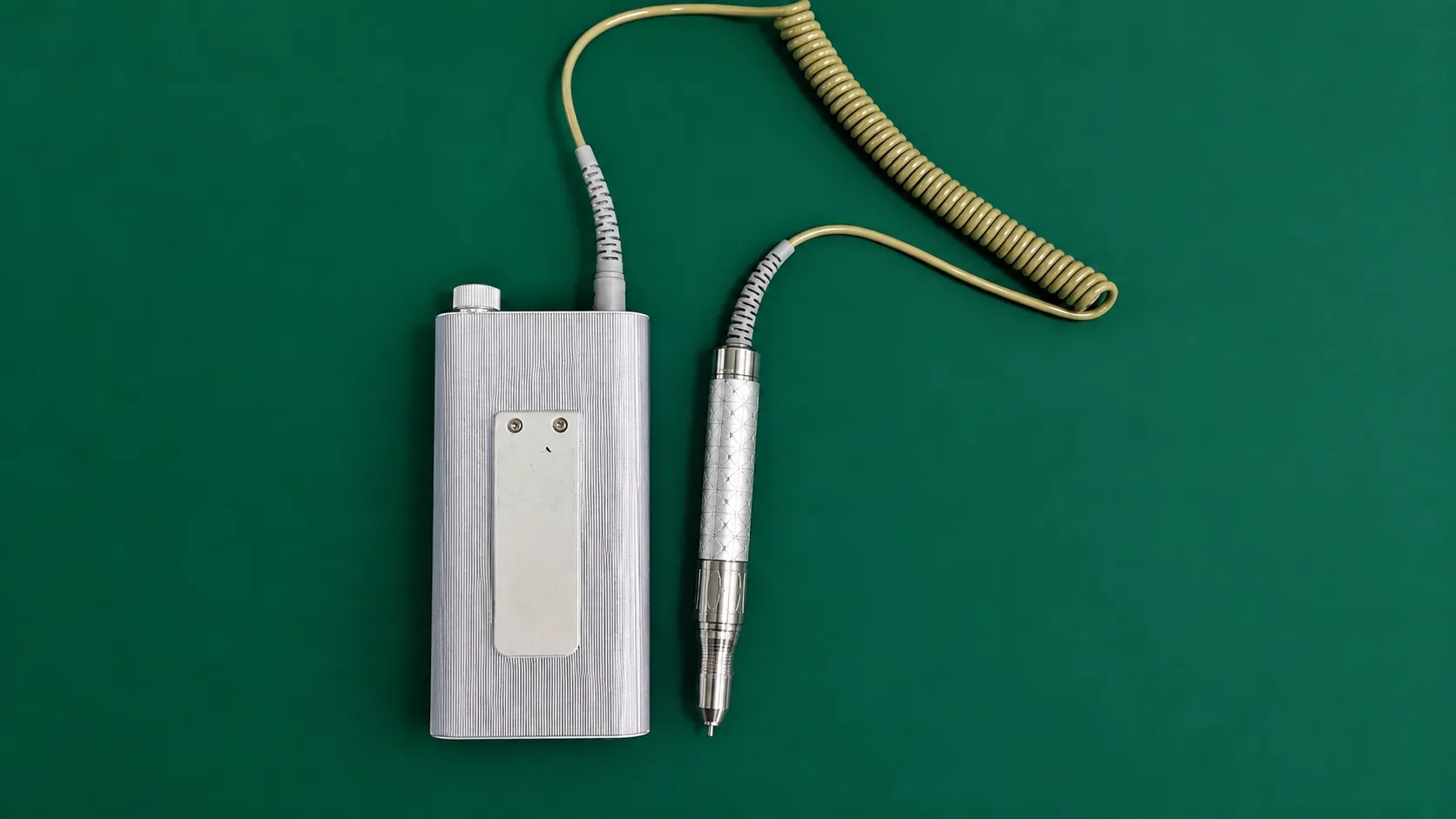 Electric grinder control unit connected to handpiece powered by 1650NR-01A-24.0 brushless DC motor